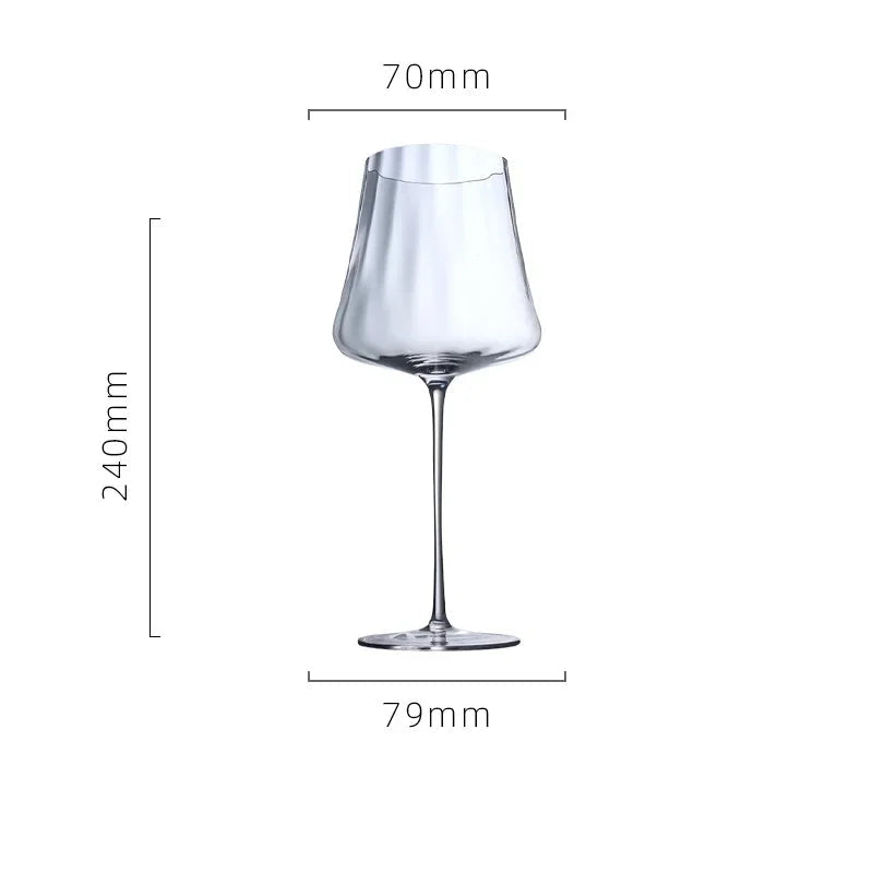 Clear wine glass with dimensions on a white background